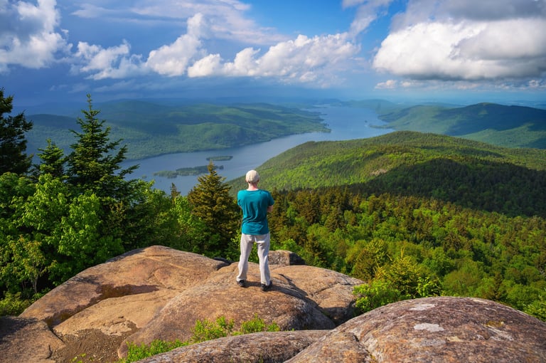 Hiker enjoying a scenic mountain lake view